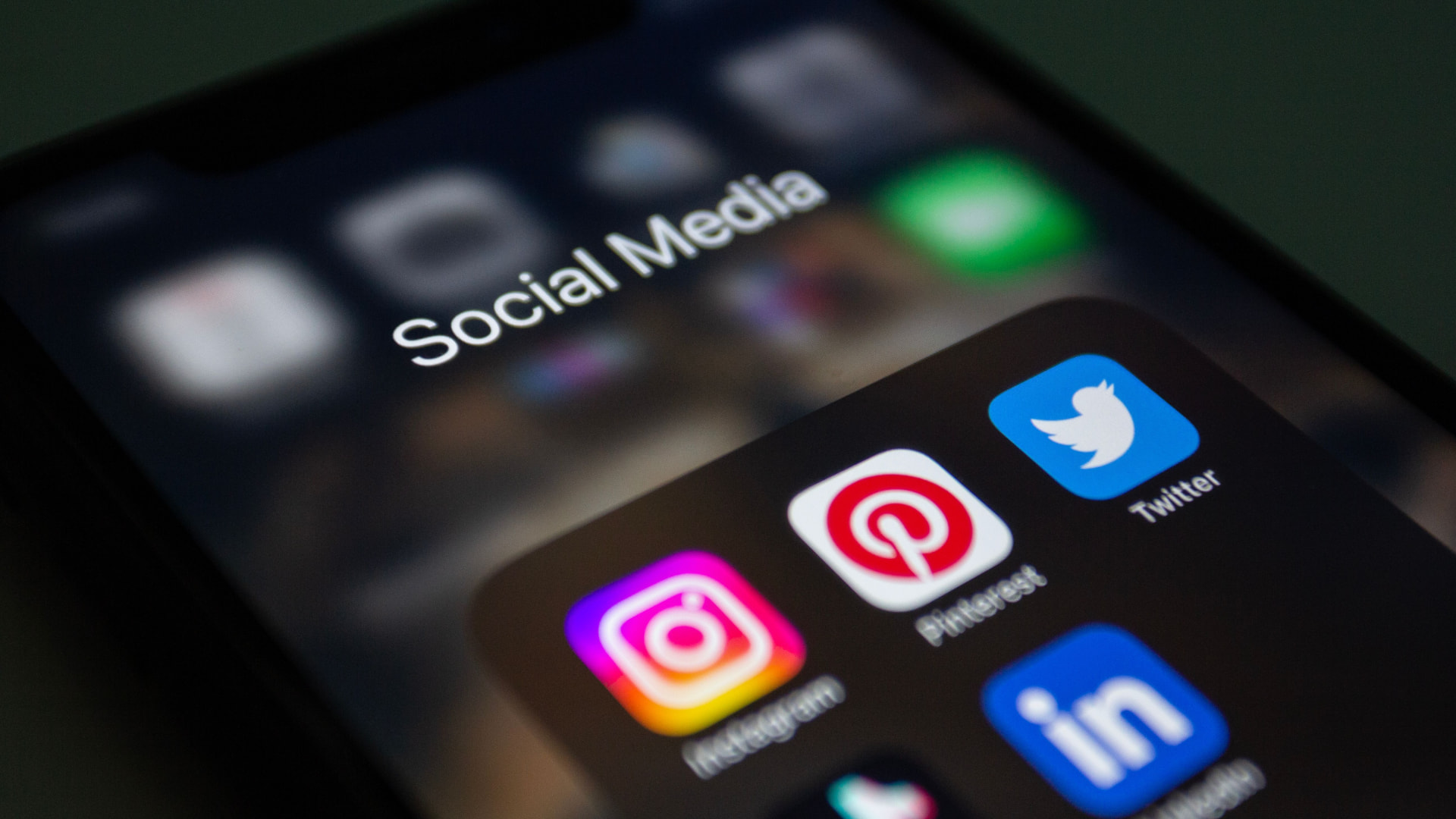 Social media apps on a smartphone screen