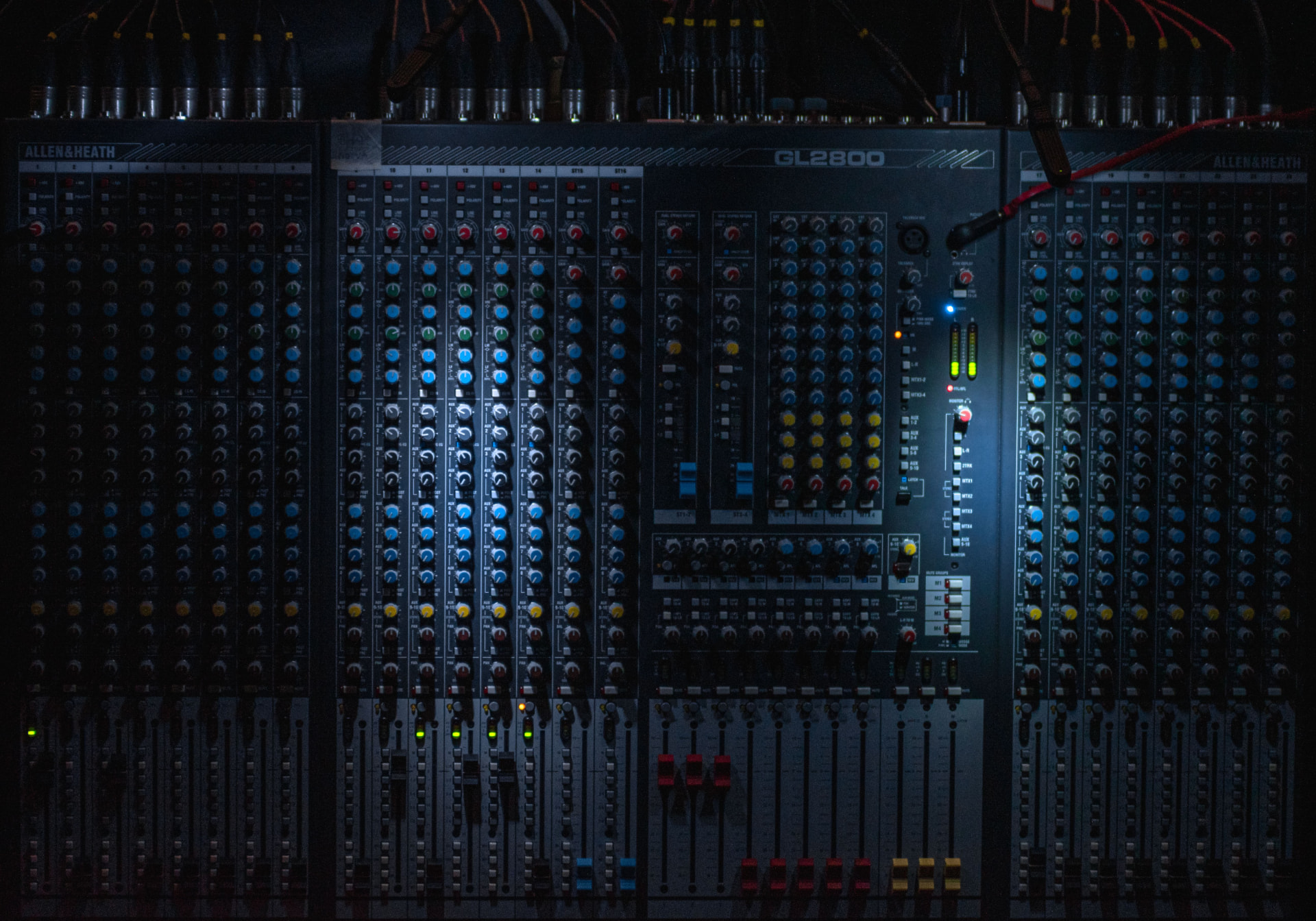 Analogue mixing console in a dark studio